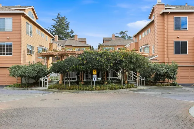 a view of a house with a street