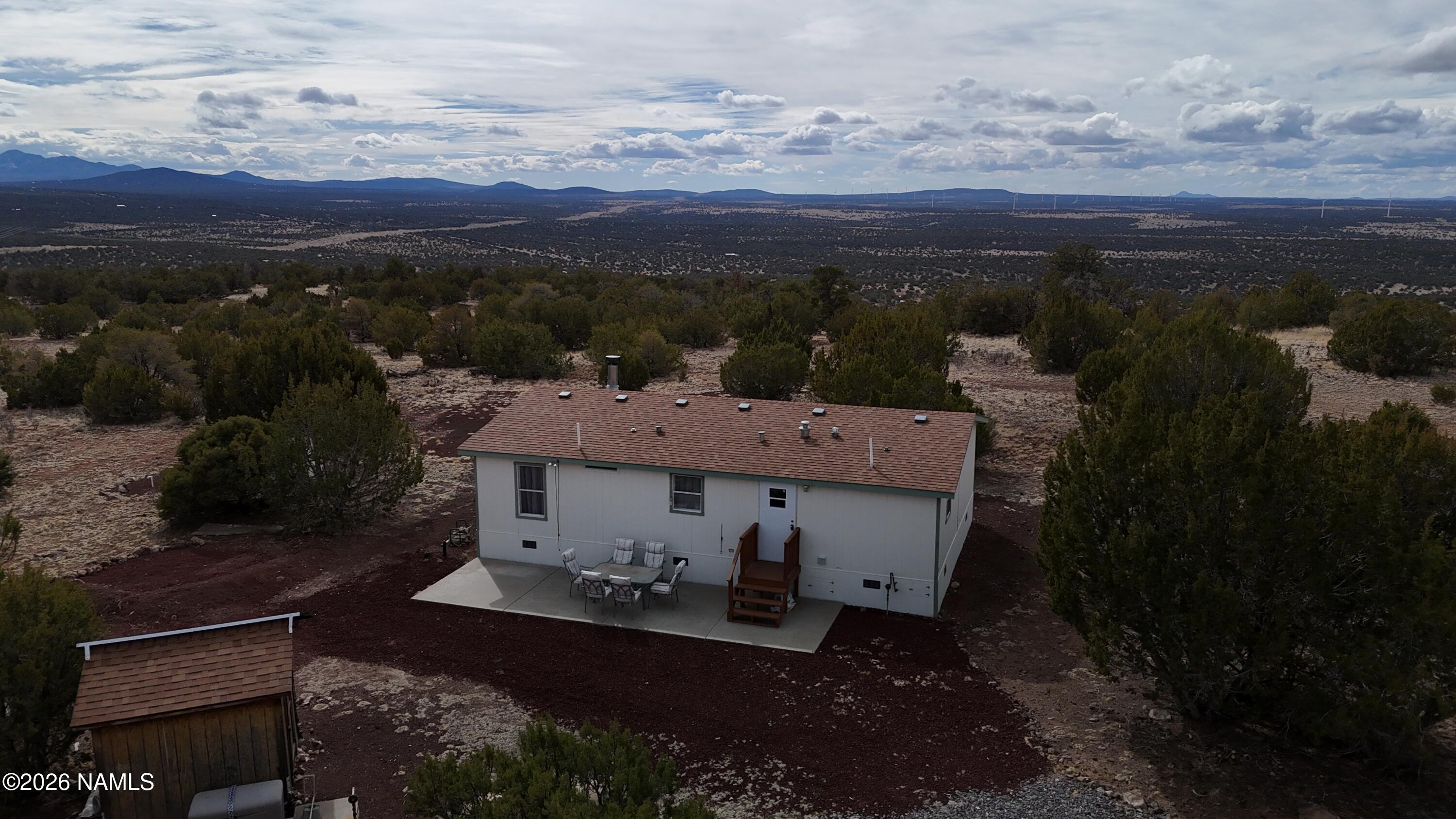 768 Mountain Cat Road Williams, AZ 86046 - Photo 23 of 37 a view of a terrace with a garden
