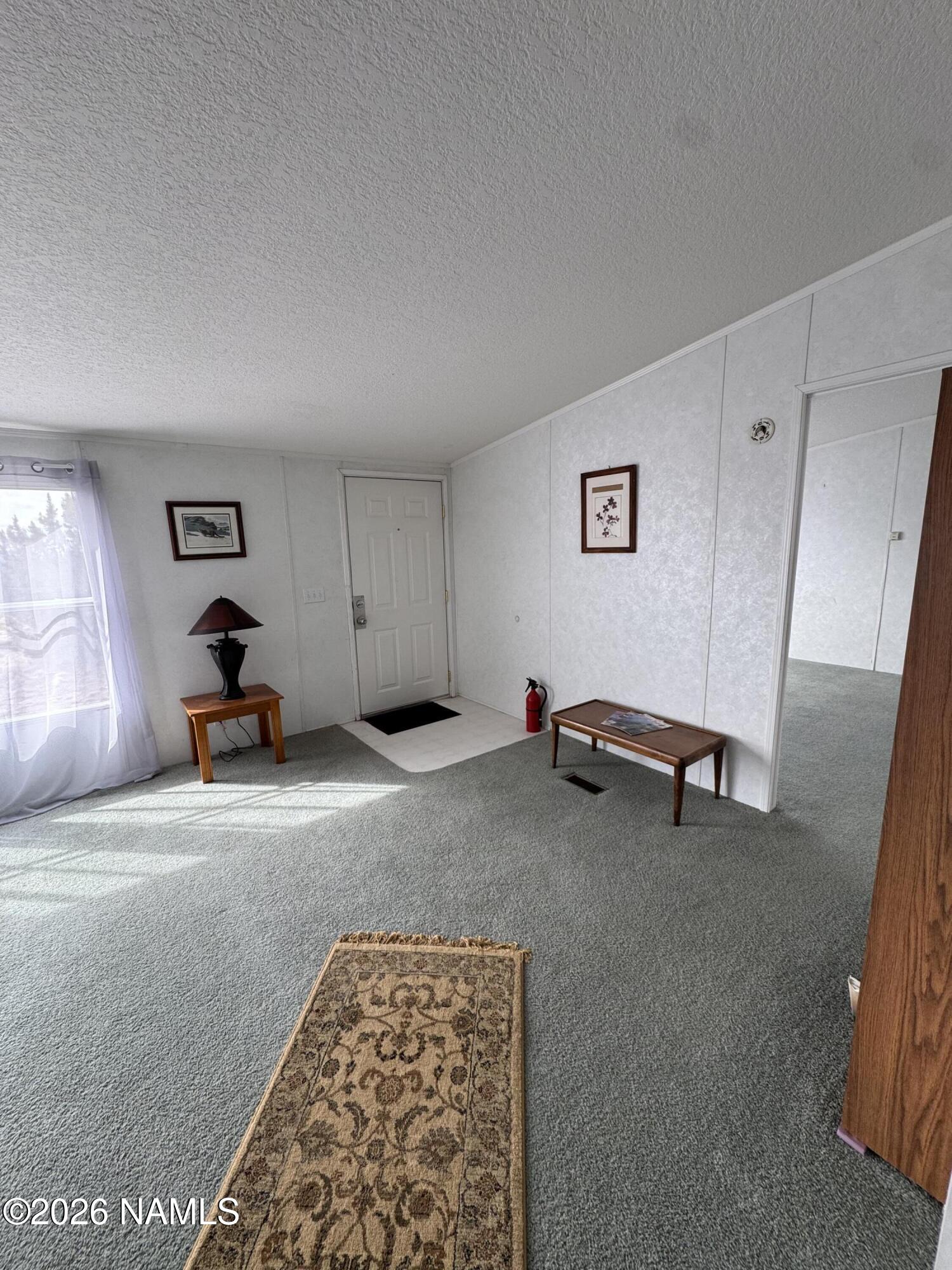 768 Mountain Cat Road Williams, AZ 86046 - Photo 6 of 37 a view of room with gym equipment