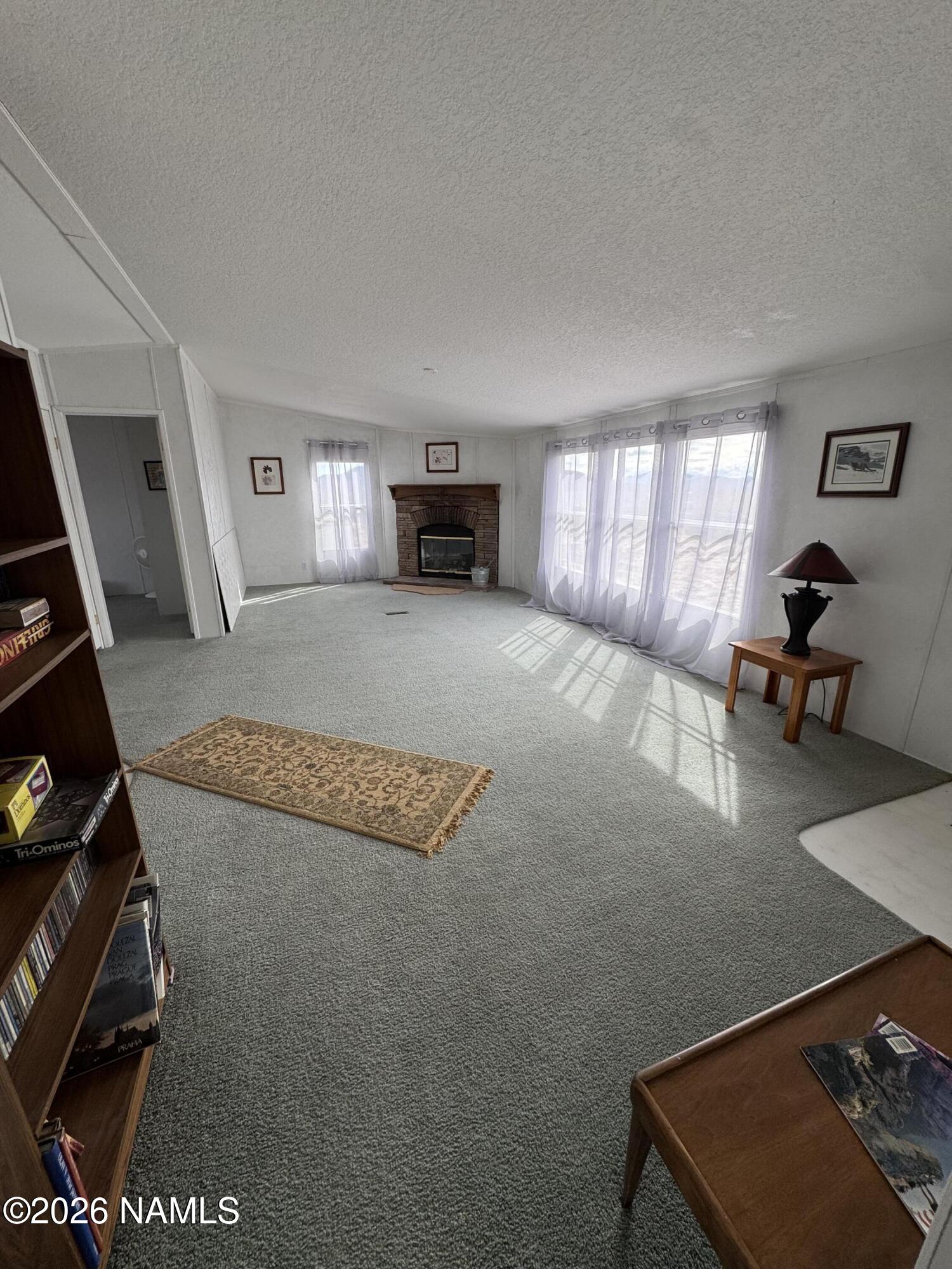 768 Mountain Cat Road Williams, AZ 86046 - Photo 8 of 37 a living room with furniture