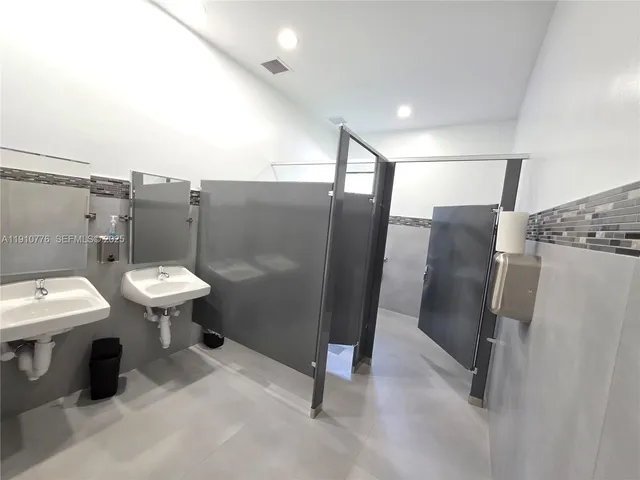 a swimming pool with outdoor seating and yard