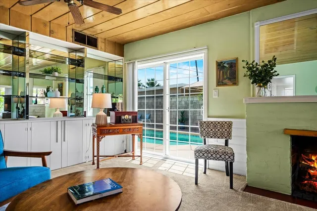 a living room with furniture and a table