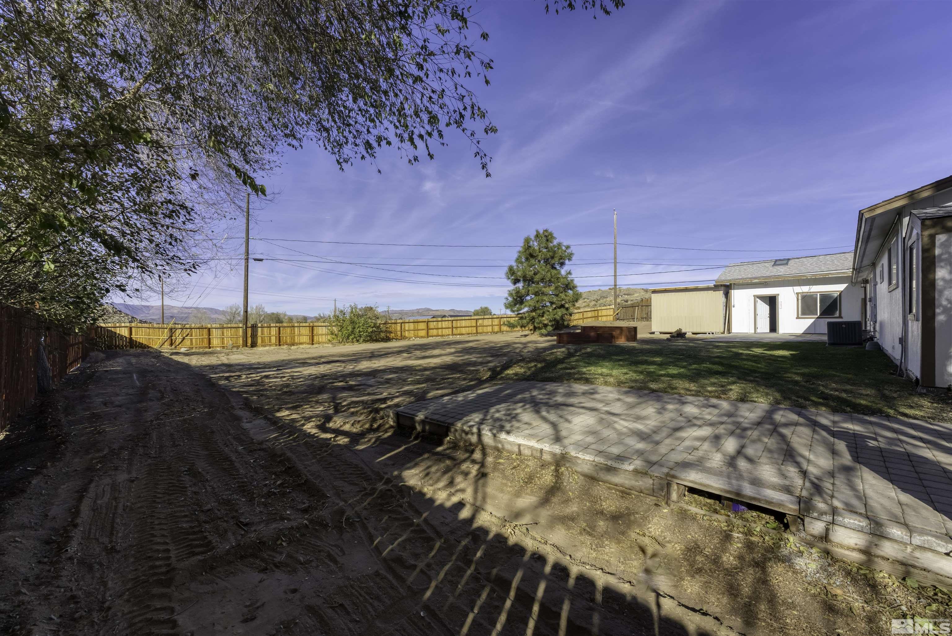8625 Channel Way Reno, NV 89506 - Photo 28 of 29 a view of a yard with an outdoor space