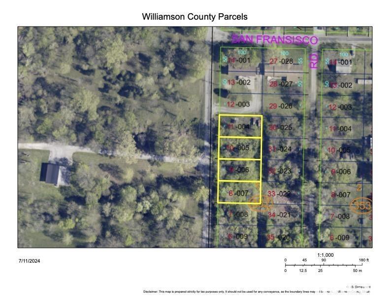 a picture of a bench in front of a building