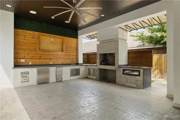 a kitchen with stainless steel appliances granite countertop a stove and a sink