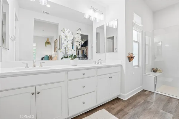 a bedroom with a bed and a bathroom