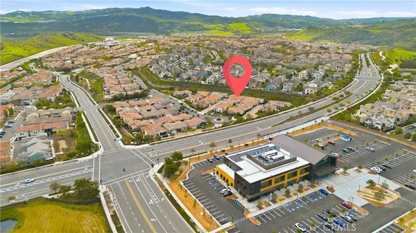 a view of a livingroom with furniture and white walls
