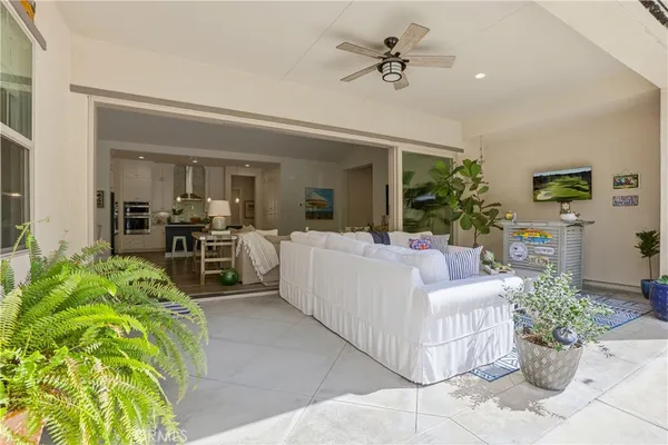 a view of a chairs and table in the patio