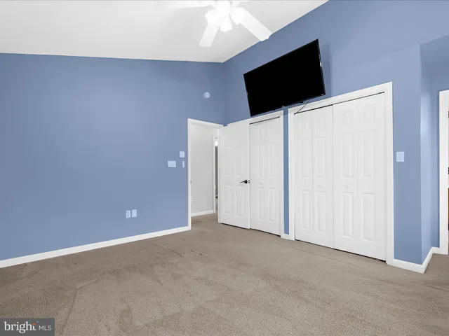 a view of a livingroom with a flat screen tv