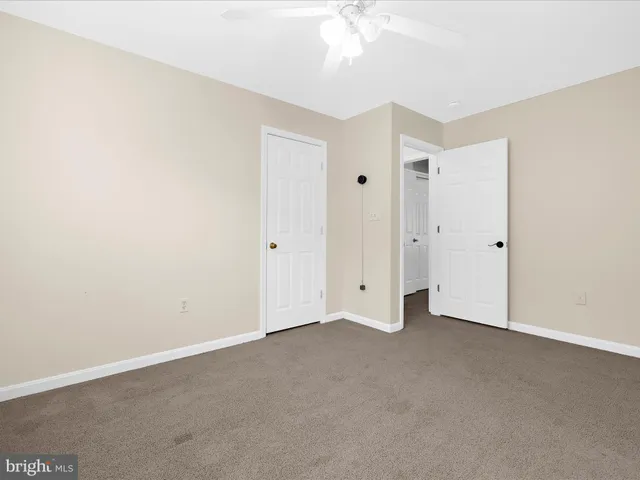 an empty room with a bathroom