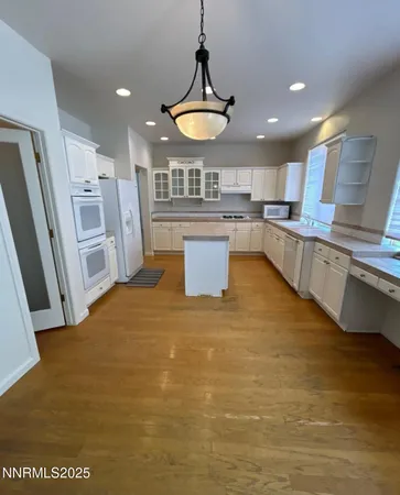 a large kitchen with a lot of counter space