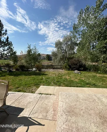 a view of a garden with basketball court