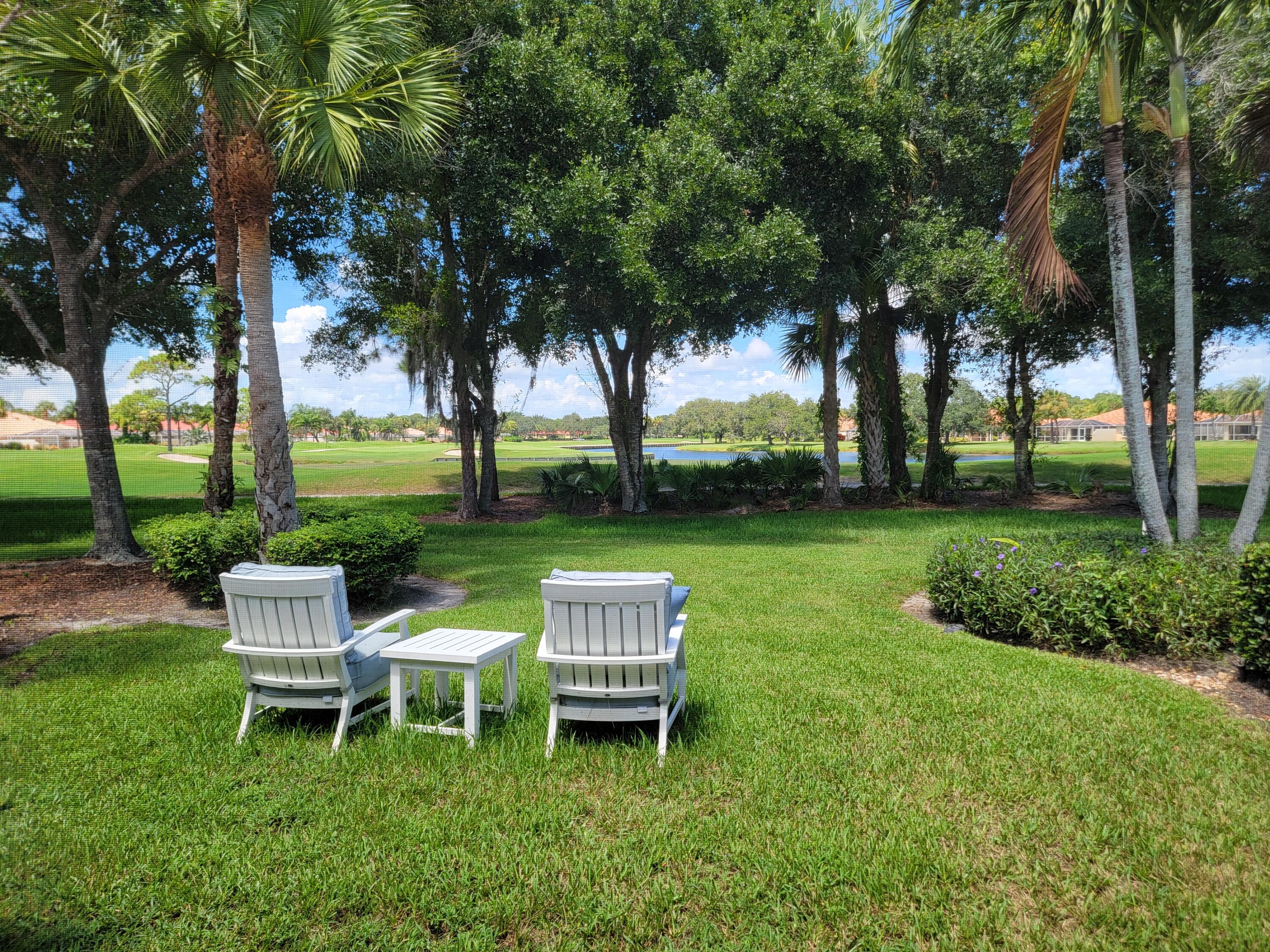889 Southwest Balmoral Trace Stuart, FL 34997 - Photo 41 of 67 Backyard with Gold and Lake views
