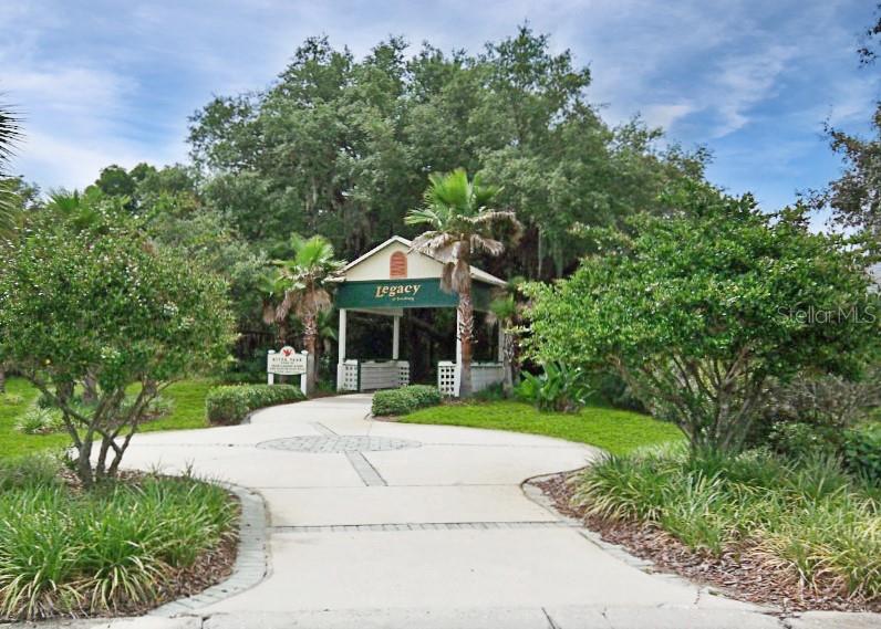 27328 Pine Straw Road Leesburg, FL 34748 - Photo 32 of 32 a front view of a house with a yard