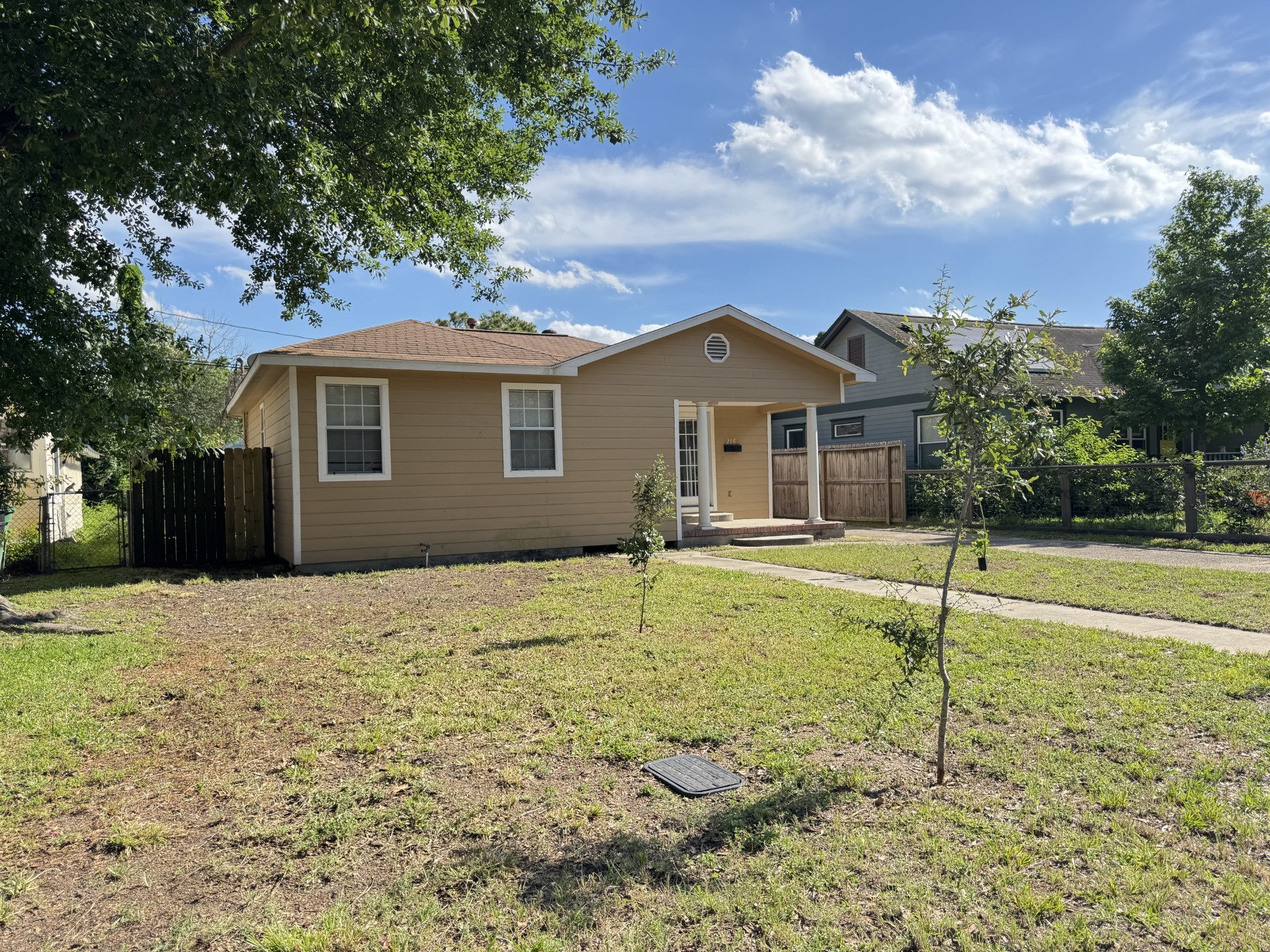 216 Gale Street Houston, TX 77009 - Photo 2 of 12 a house with trees in the background