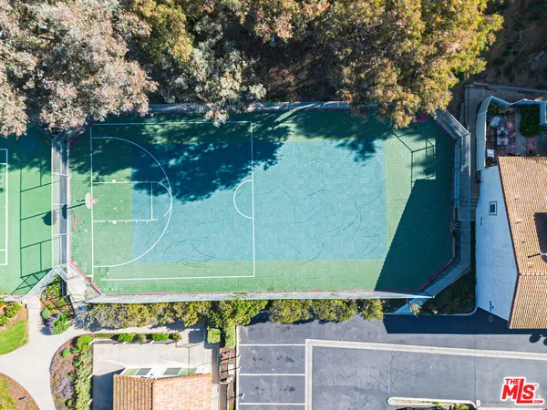 an aerial view of a house with a garden
