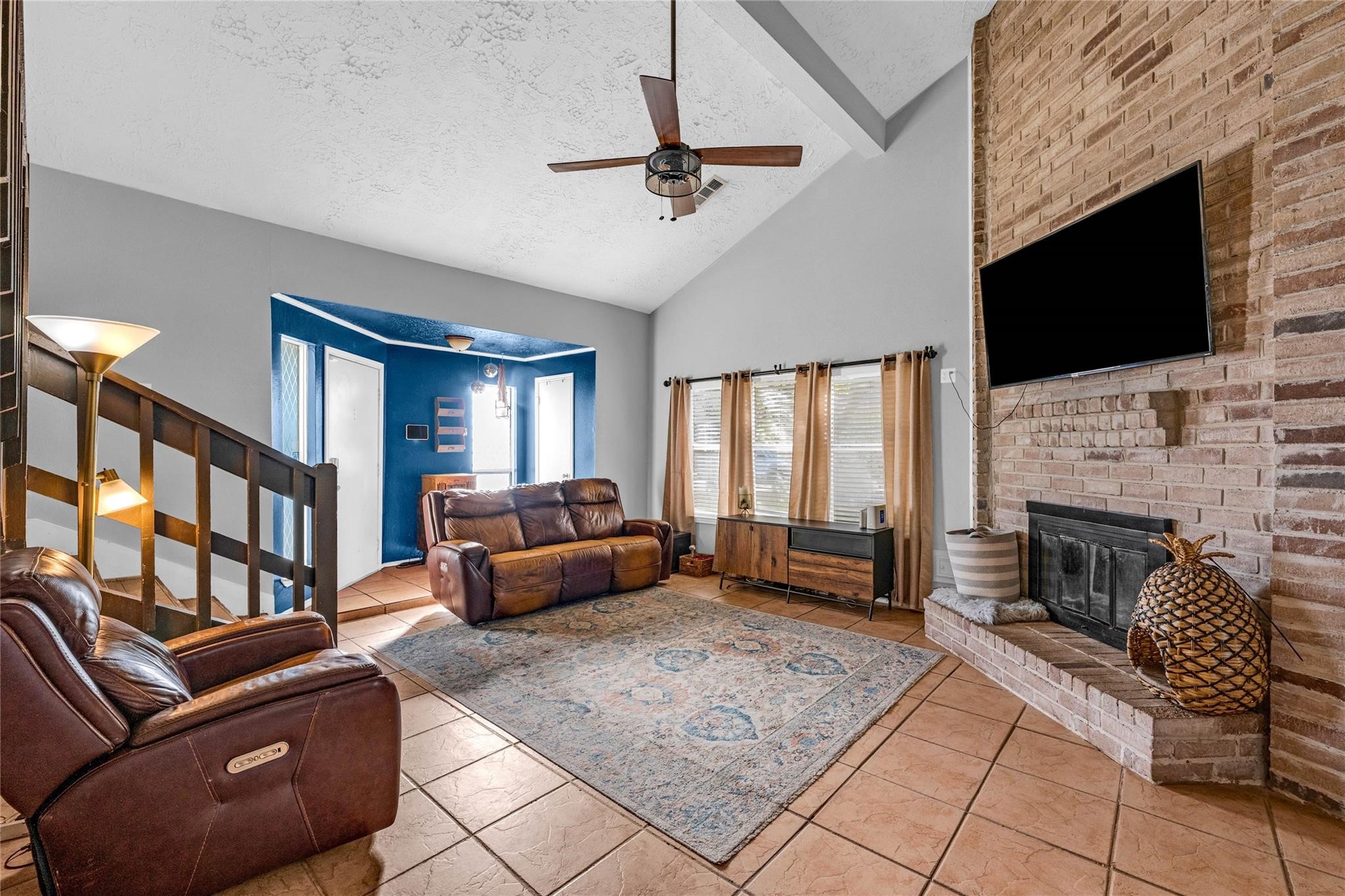 24014 Red Sky Drive Spring, TX 77373 - Photo 20 of 23 a living room with furniture or fireplace and a flat screen tv