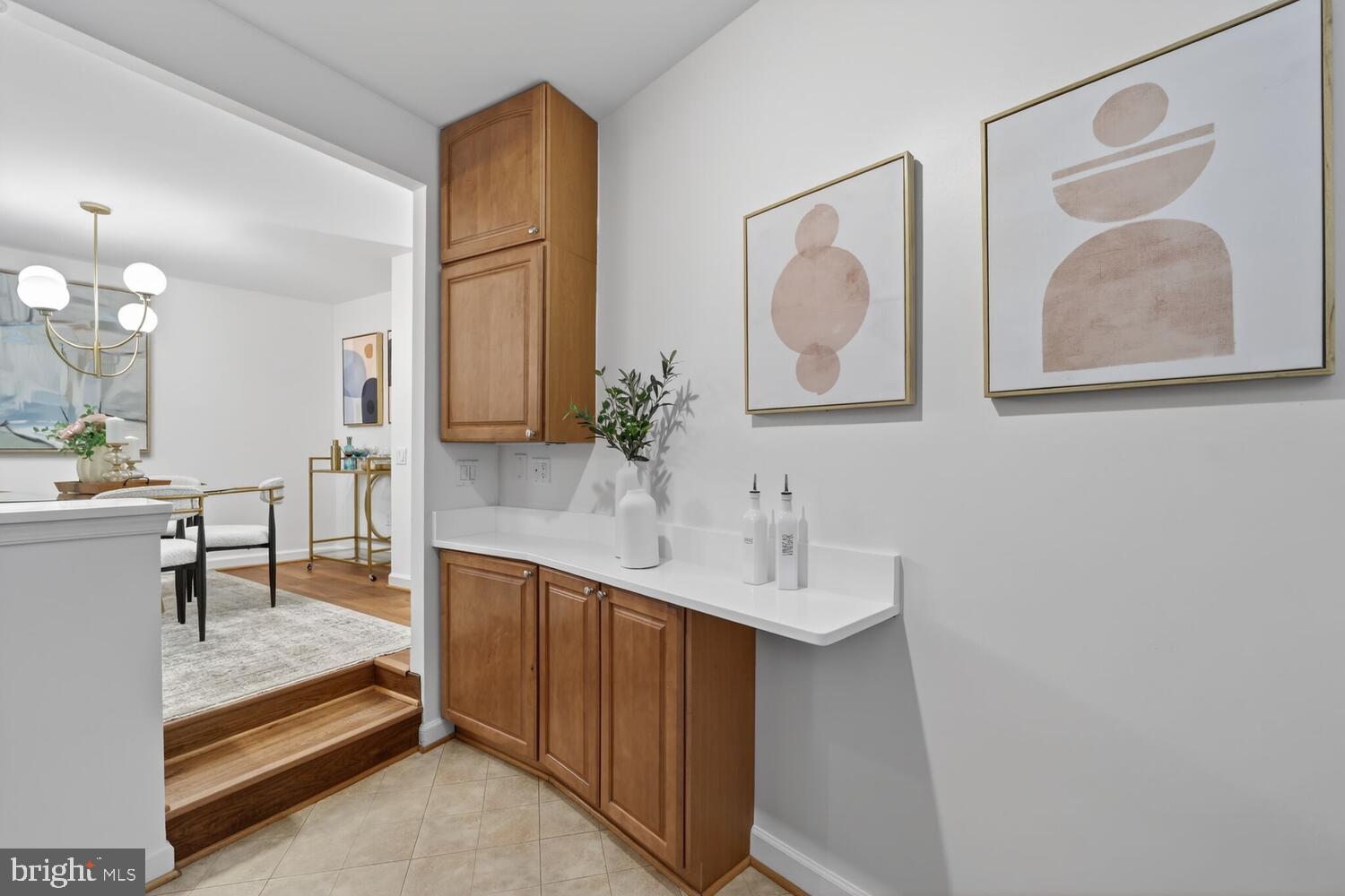 2126 Connecticut Avenue Northwest, Unit 17 Washington, DC 20008 - Photo 16 of 36 a en suite bathroom with a double vanity sink and a mirror