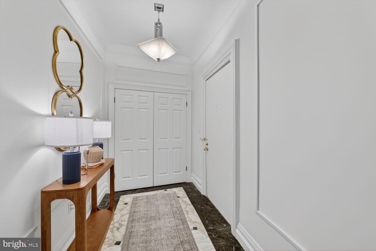 2126 Connecticut Avenue Northwest, Unit 17 Washington, DC 20008 - Photo 2 of 36 a view of an entryway with wooden floor