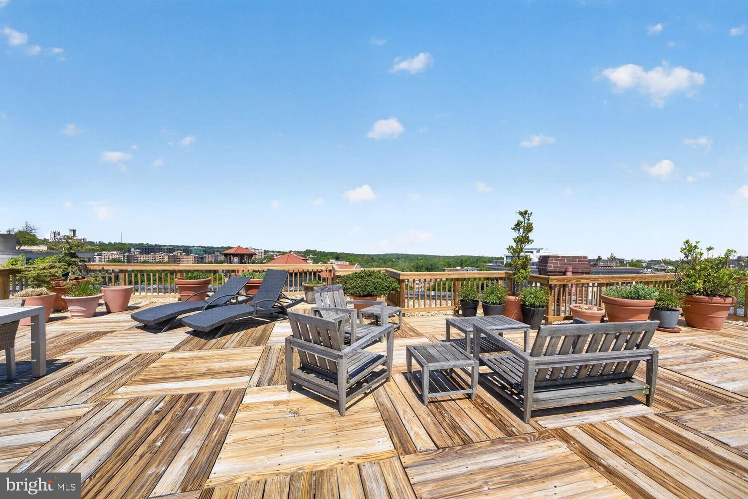 2126 Connecticut Avenue Northwest, Unit 17 Washington, DC 20008 - Photo 33 of 36 a view of a terrace with seating area