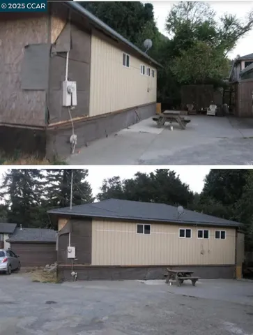 an aerial view of a house with a yard