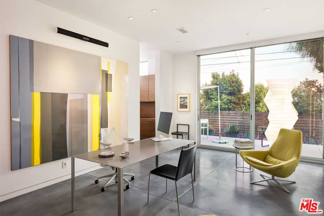 7800 West 81st Street Playa del Rey, CA 90293 - Photo 12 of 27 a living room with furniture and a large window
