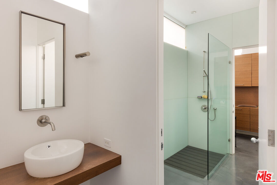 7800 West 81st Street Playa del Rey, CA 90293 - Photo 14 of 27 a bathroom with a sink and a mirror