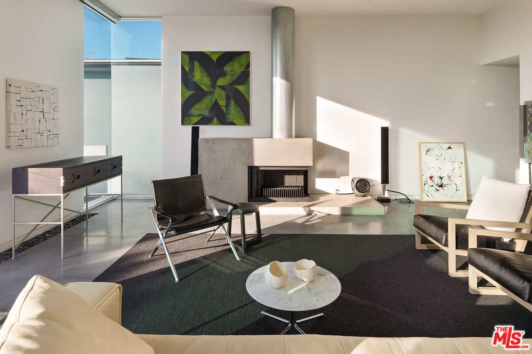 7800 West 81st Street Playa del Rey, CA 90293 - Photo 16 of 27 a living room with furniture a rug and a large window
