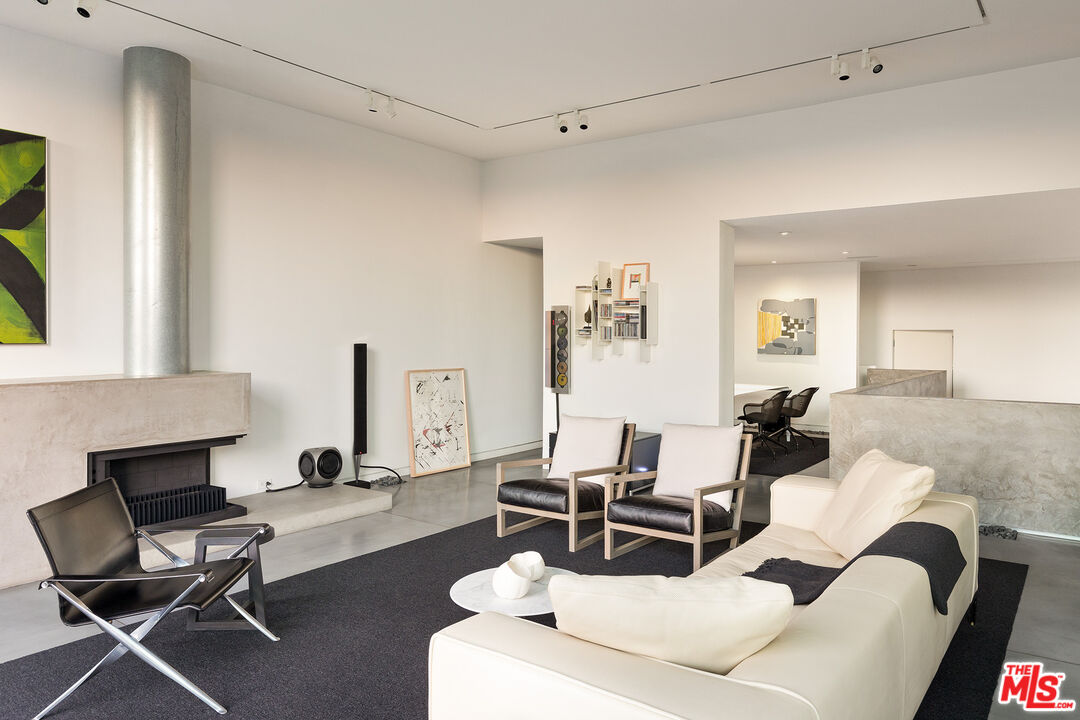 7800 West 81st Street Playa del Rey, CA 90293 - Photo 17 of 27 a living room with furniture and a fireplace