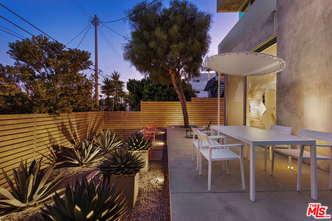 7800 West 81st Street Playa del Rey, CA 90293 - Photo 27 of 27 a view of a chairs and table in the patio