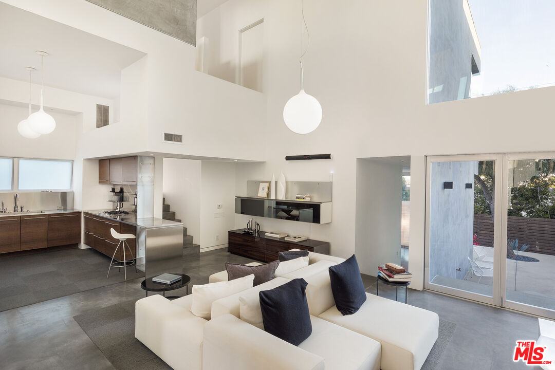 7800 West 81st Street Playa del Rey, CA 90293 - Photo 3 of 27 a living room with furniture and a large window