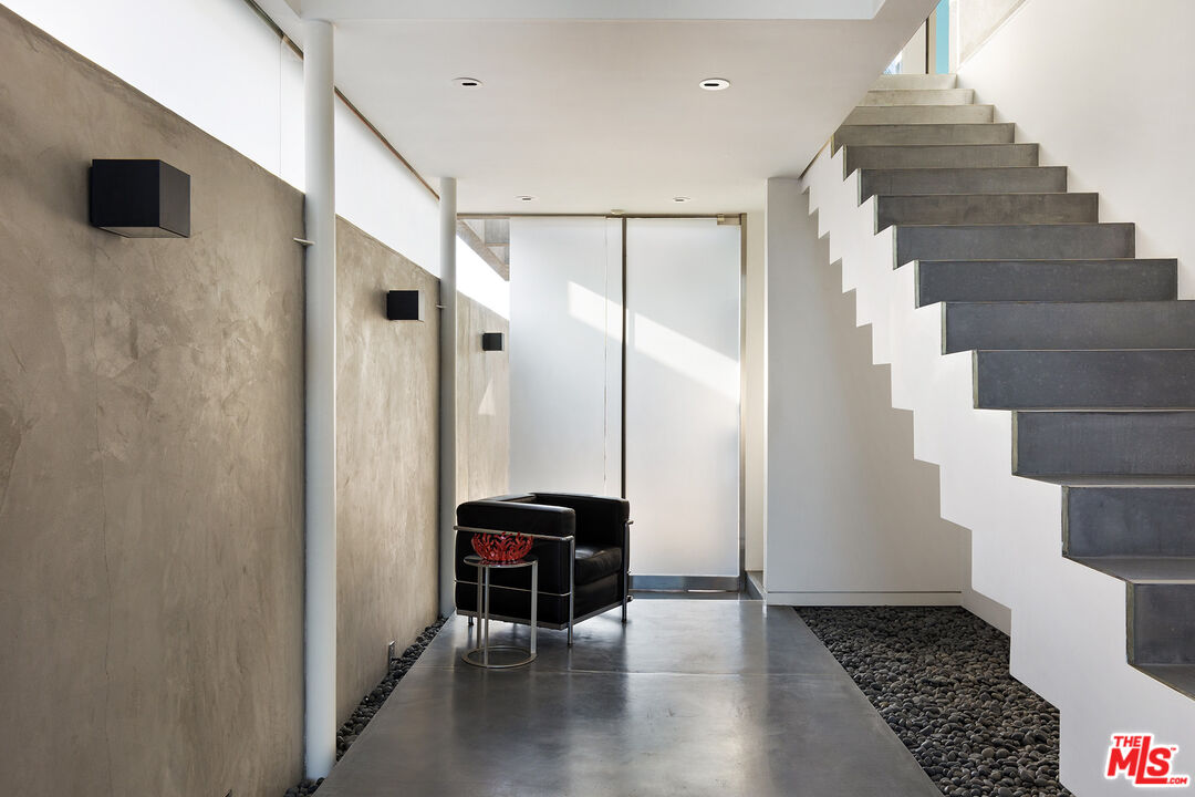 7800 West 81st Street Playa del Rey, CA 90293 - Photo 4 of 27 a view of entryway with wooden floor and stairs