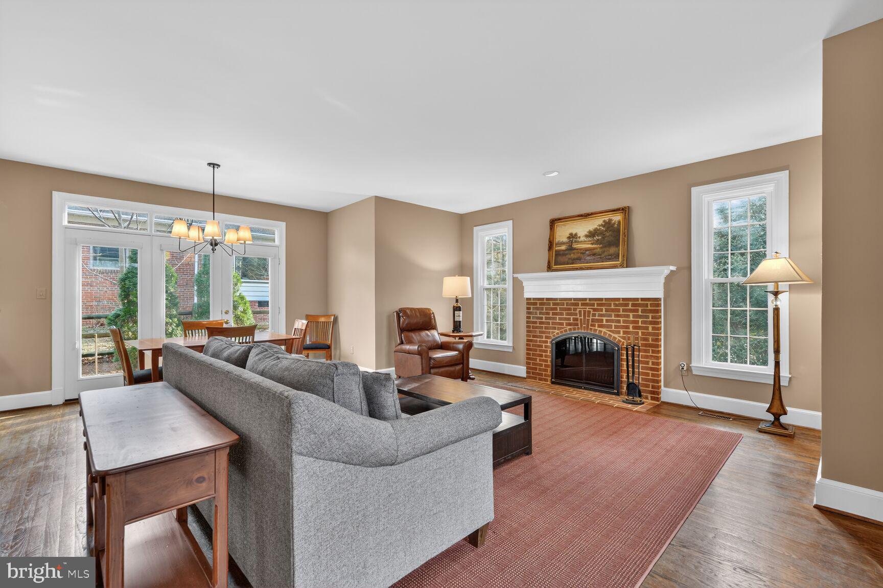 5206 Little Falls Road Arlington, VA 22207 - Photo 17 of 49 a living room with furniture and a fireplace