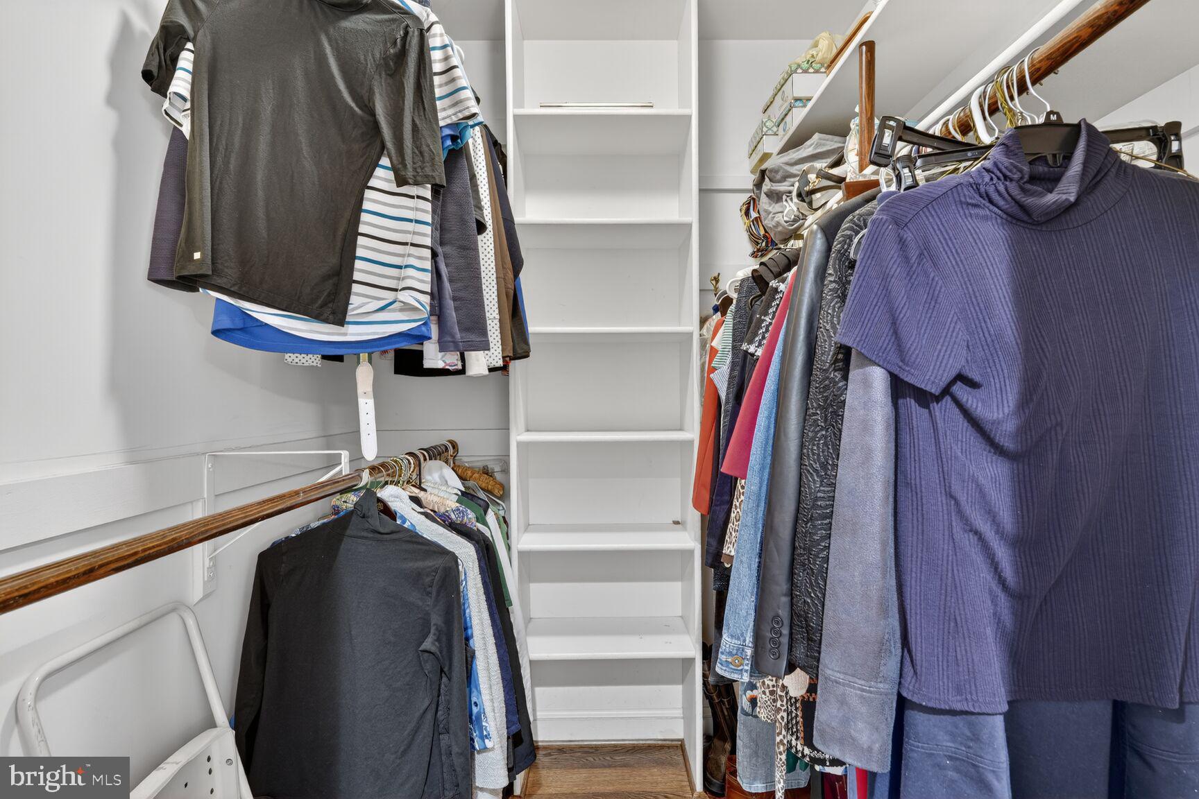 5206 Little Falls Road Arlington, VA 22207 - Photo 30 of 49 a view of walk in closet with clothes and shoes