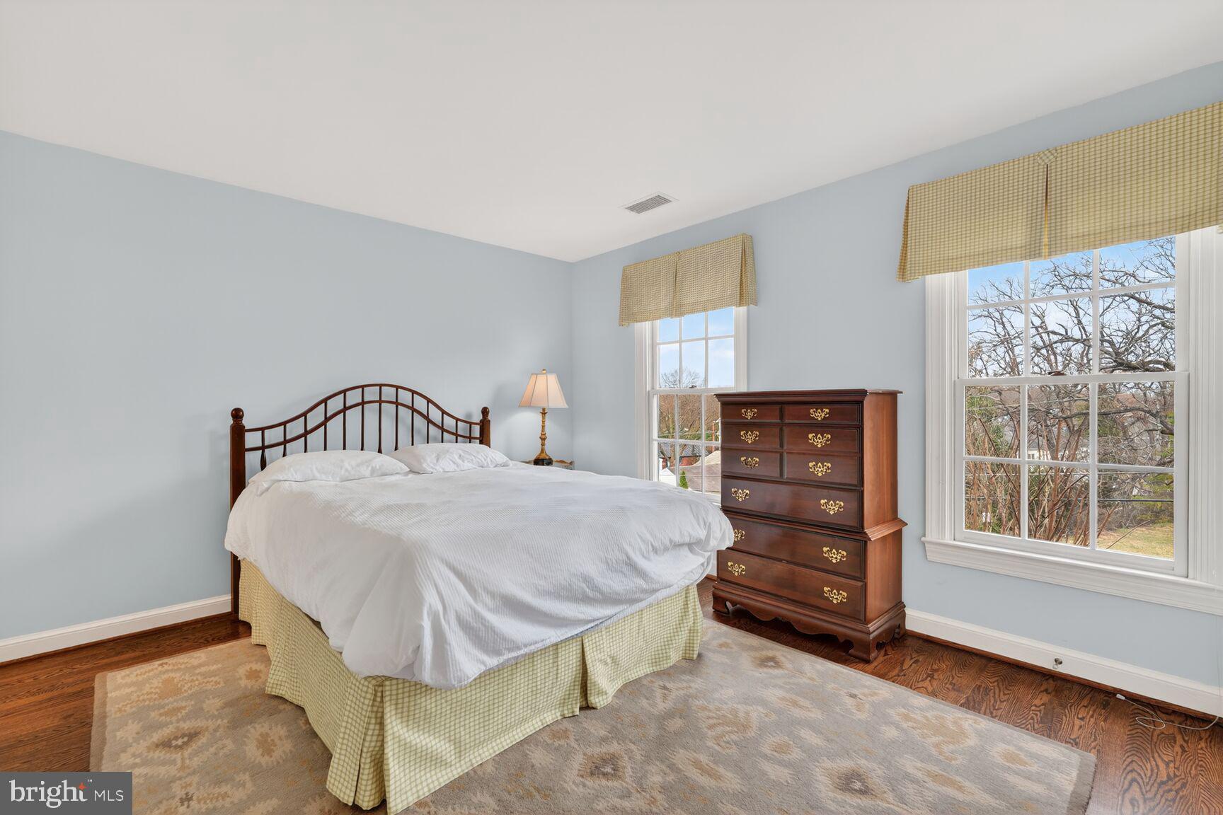 5206 Little Falls Road Arlington, VA 22207 - Photo 31 of 49 a bedroom with a bed and a window