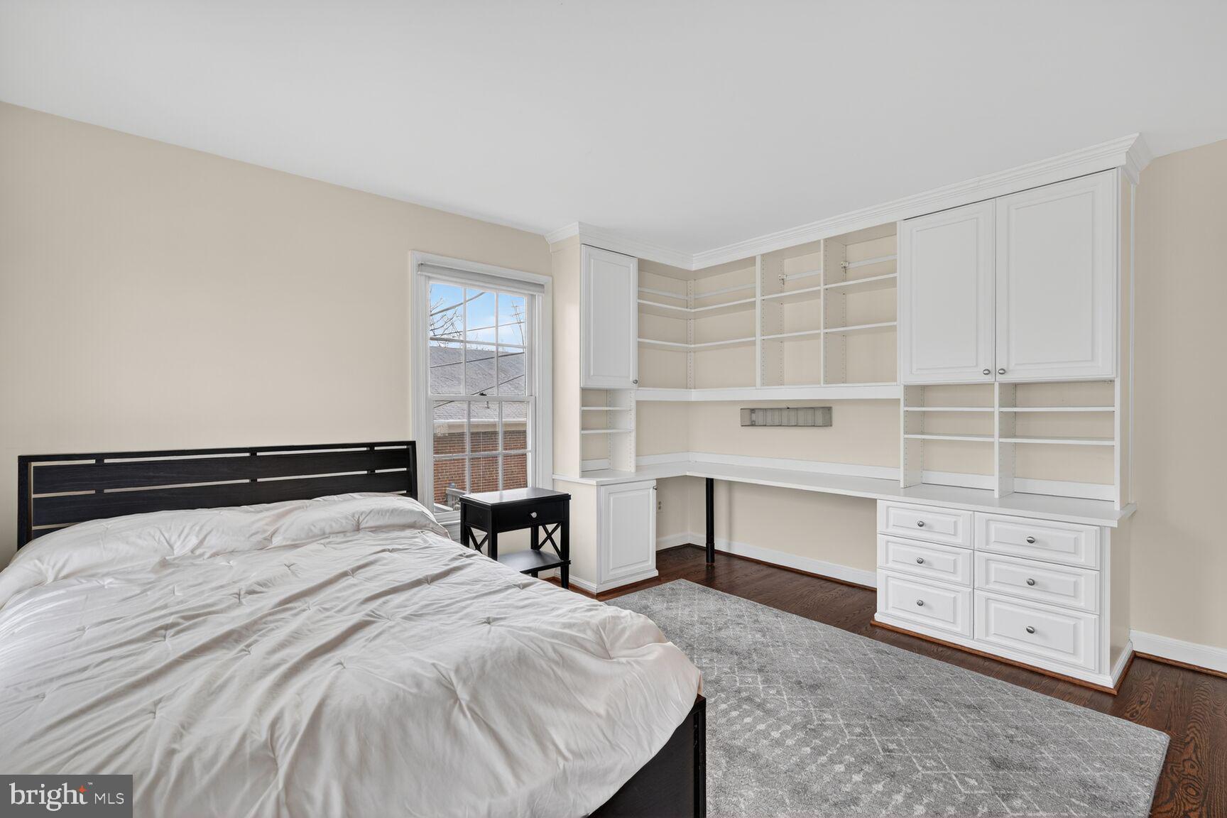 5206 Little Falls Road Arlington, VA 22207 - Photo 35 of 49 a bedroom with a bed and a window