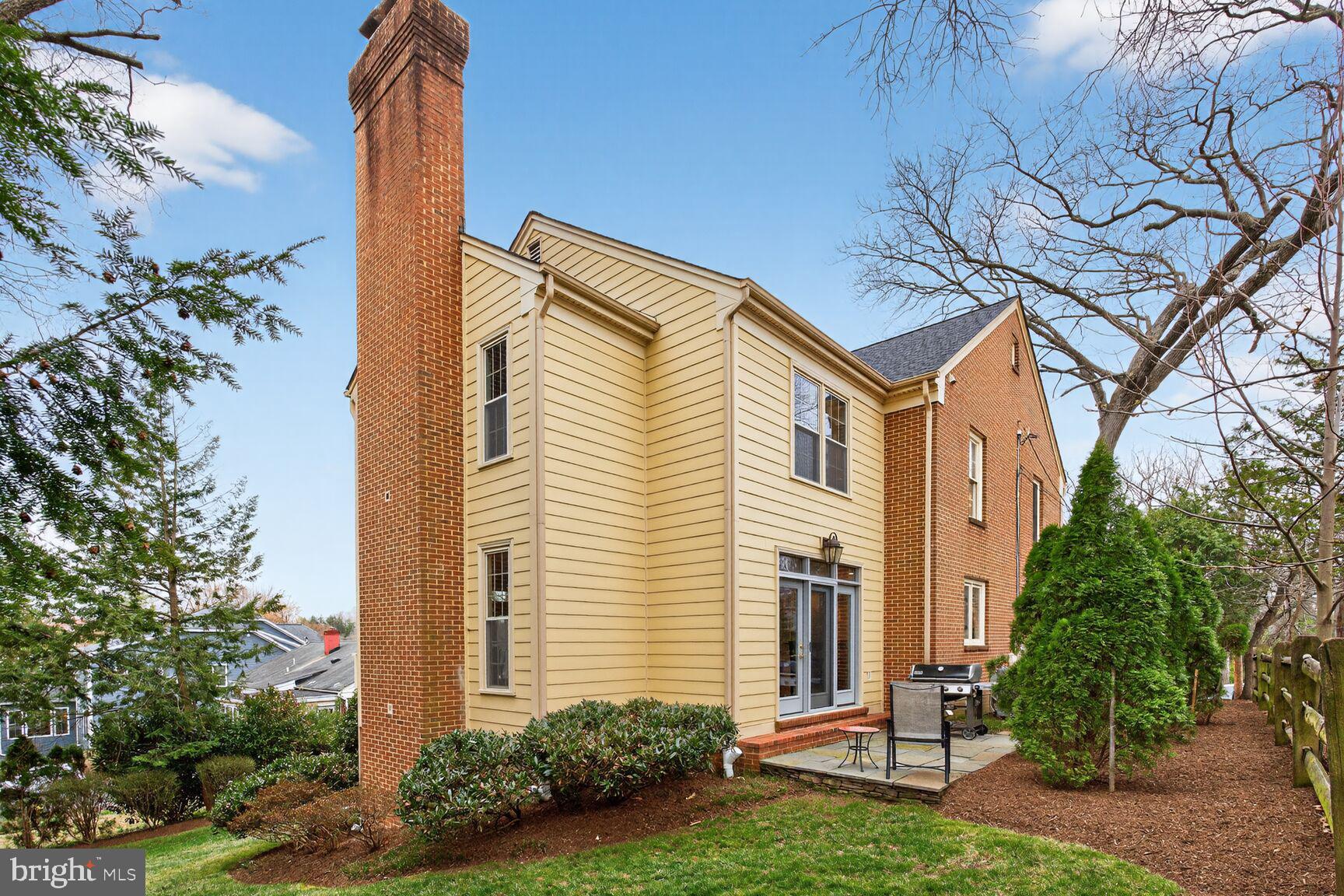 5206 Little Falls Road Arlington, VA 22207 - Photo 47 of 49 a front view of a house with garden