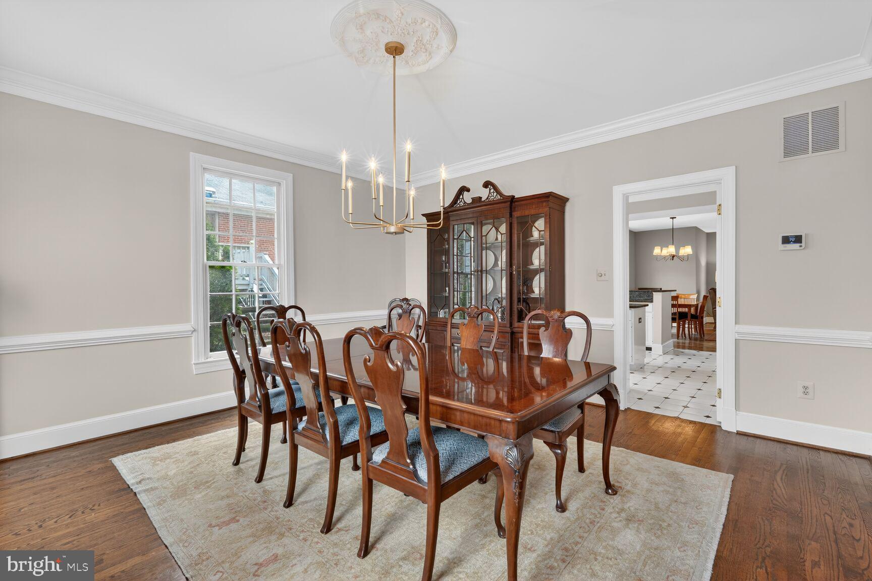 5206 Little Falls Road Arlington, VA 22207 - Photo 10 of 49 a view of a dining room with furniture and wooden floor