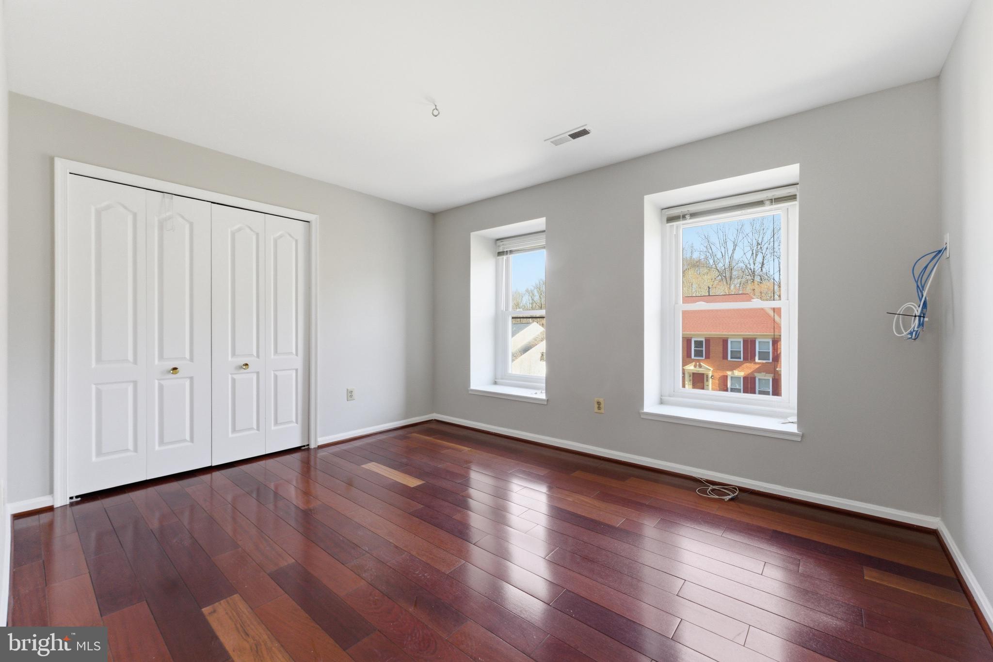 712 Brandon Green Drive Silver Spring, MD 20904 - Photo 25 of 41 Bright and airy room with hardwood floors.