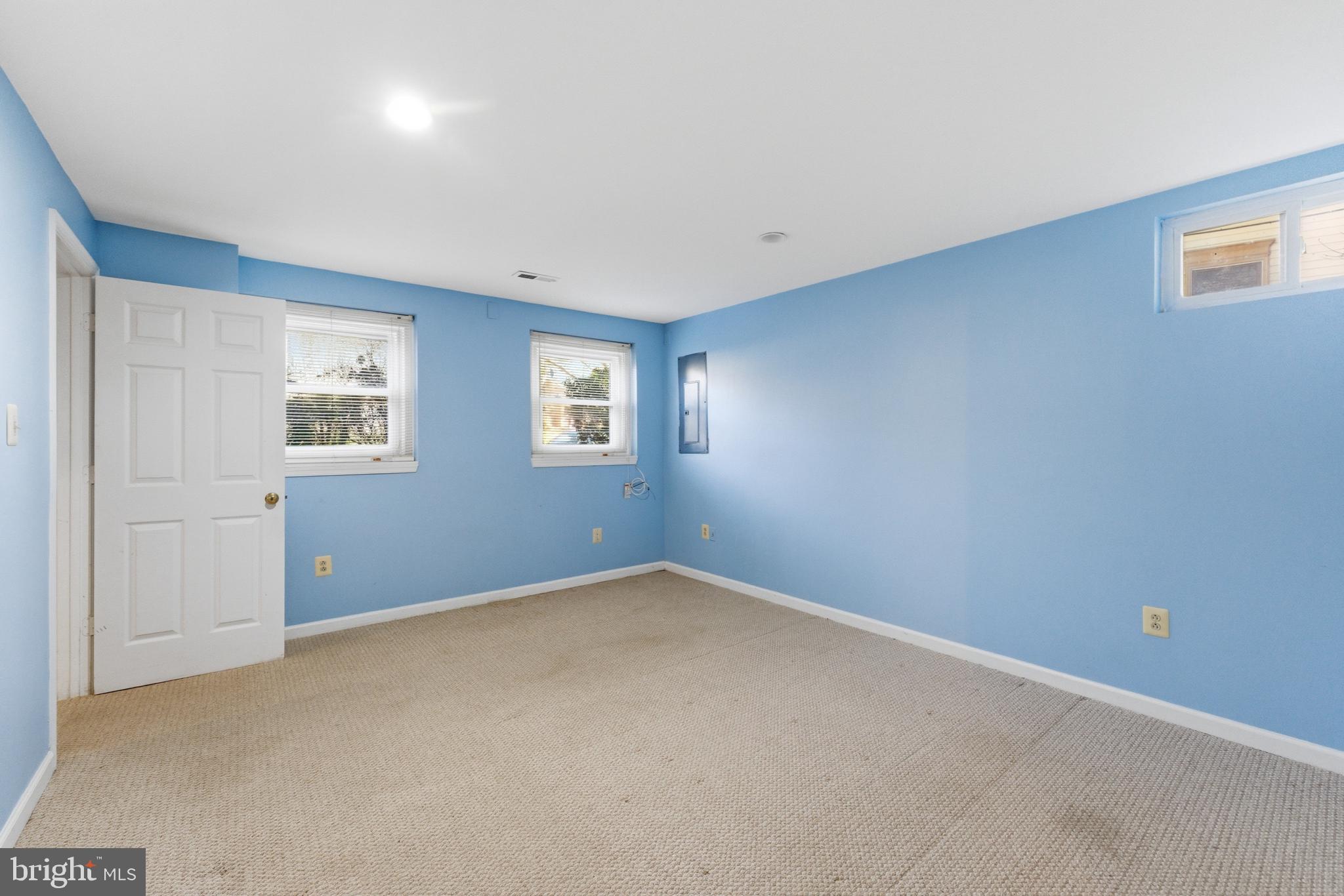 712 Brandon Green Drive Silver Spring, MD 20904 - Photo 34 of 41 Bright and airy blue-walled space.