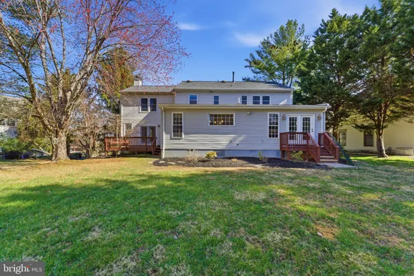 front view of a house with a big yard