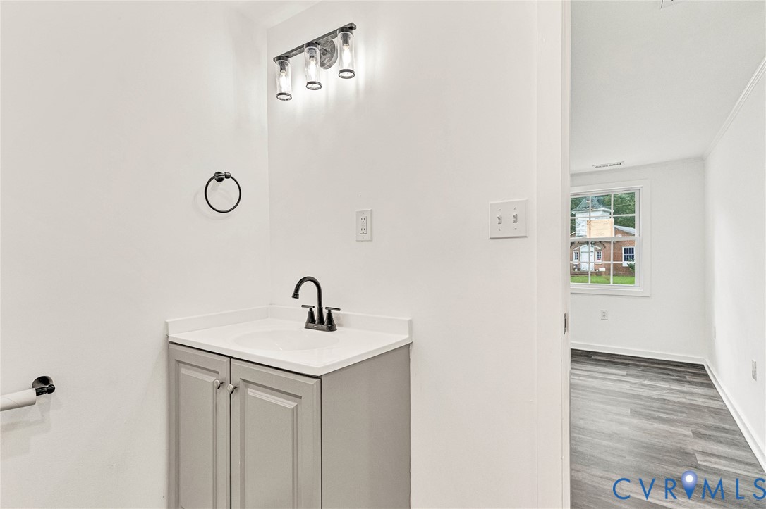 21139 Pendleton Road Bowling Green, VA 22427 - Photo 27 of 41 Vanity with white countertop, integrated sink, and