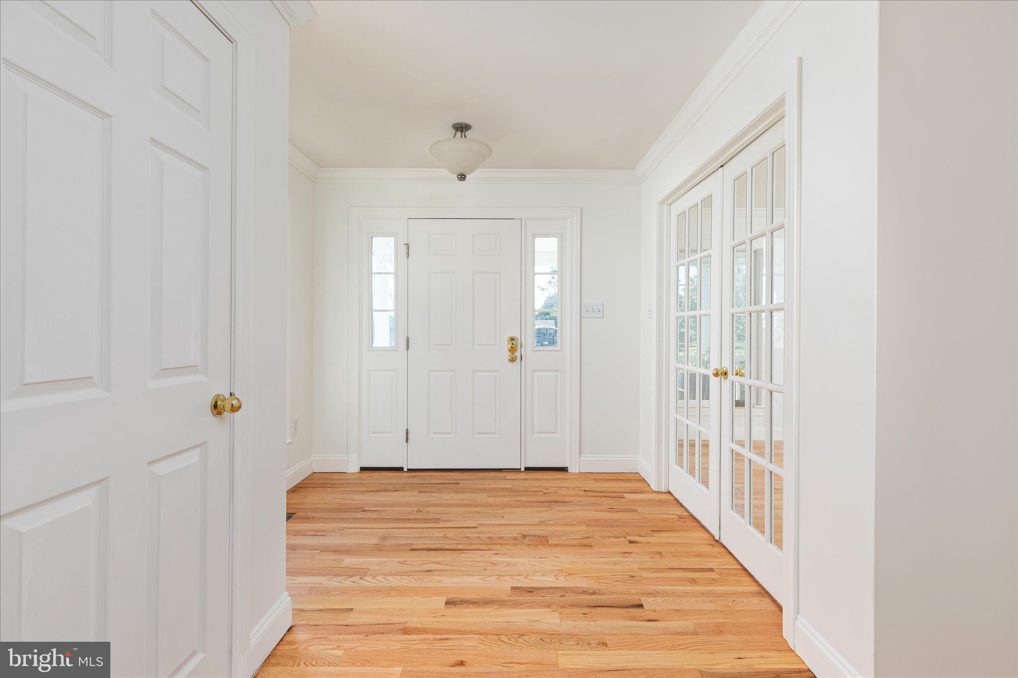 1200 Salem Church Road Stephens City, VA 22655 - Photo 3 of 69 a view of a hallway with wooden floor and staircase