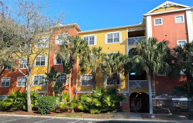 a front view of a house with trees