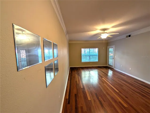 a view of an empty room and window