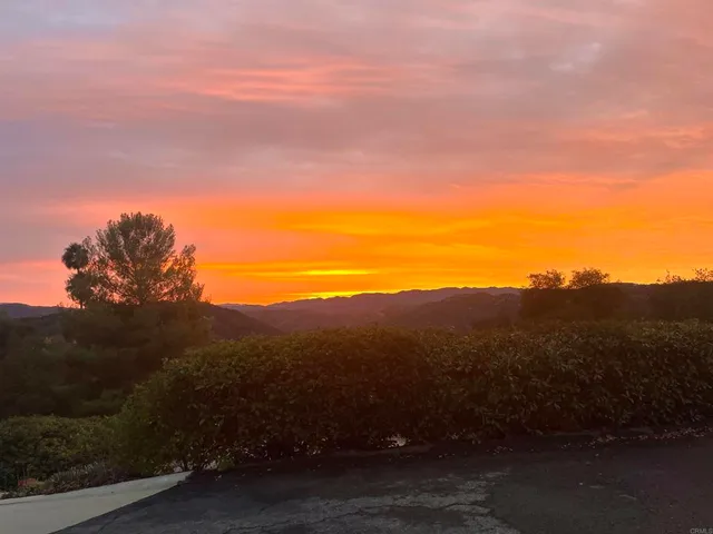 a kitchen with stainless steel appliances granite countertop a sink and a stove