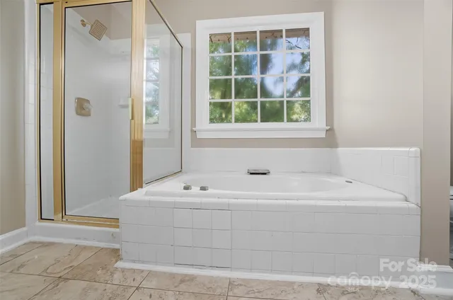 a bathroom with a sink and a window