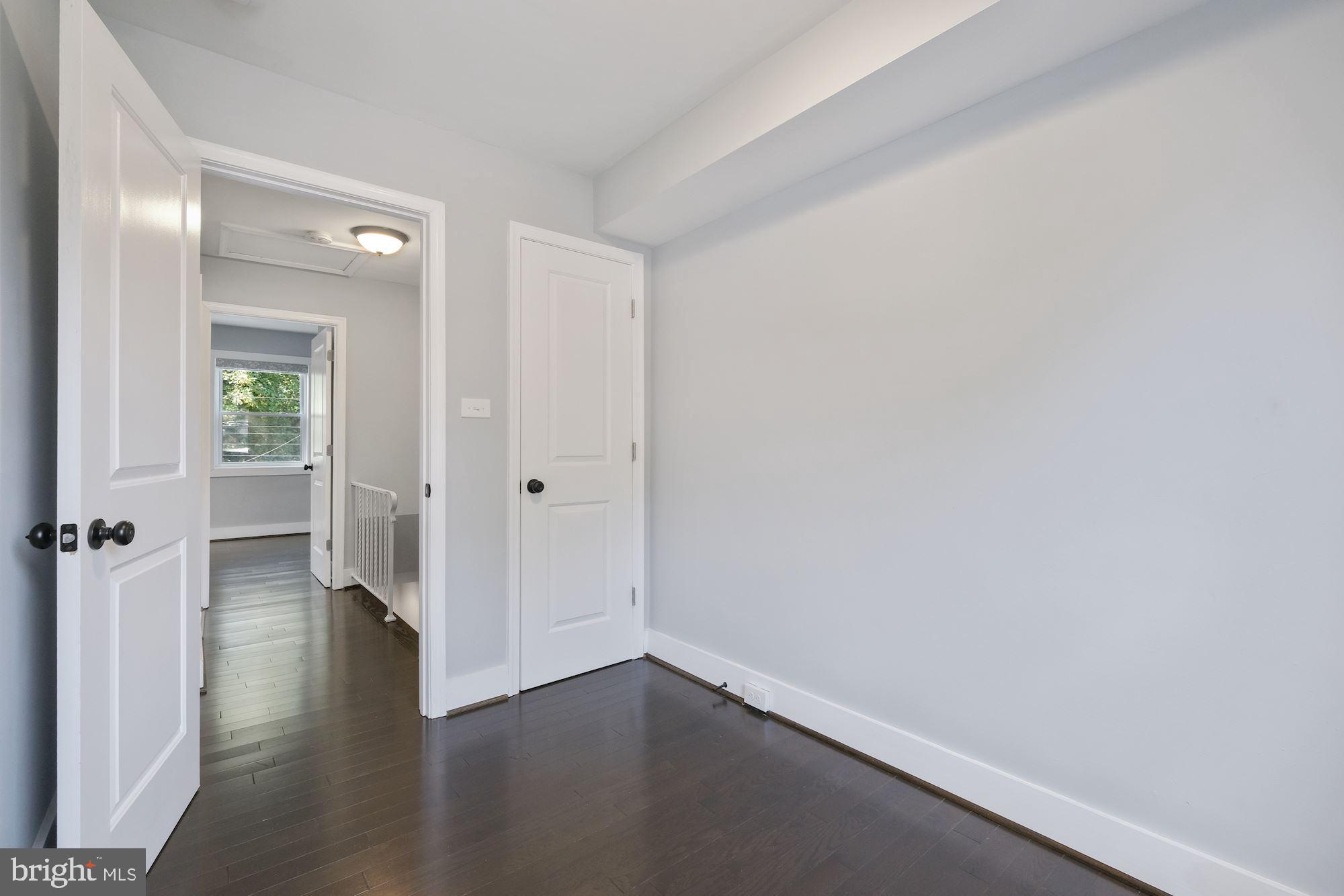3158 M Place Southeast Washington, DC 20019 - Photo 14 of 22 wooden floor in an empty room