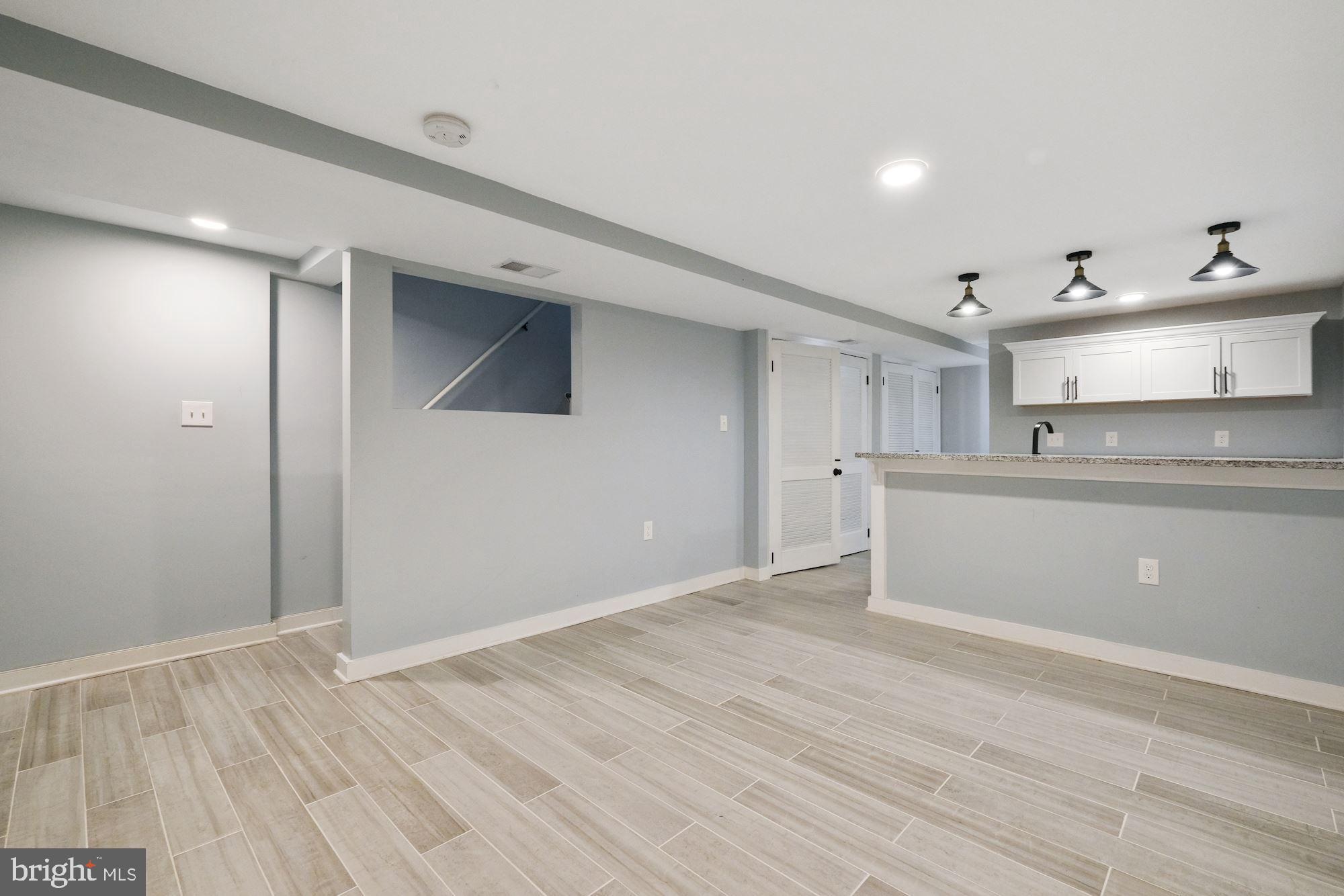 3158 M Place Southeast Washington, DC 20019 - Photo 7 of 22 a view of kitchen with wooden floor