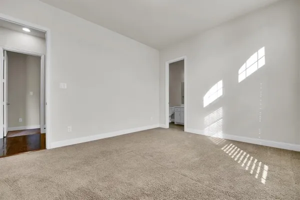 a bathroom with a sink vanity and mirror